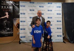 My brother Ryan, Joe Sciacca and I in a workspace for news reporters.