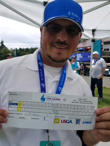 2a - Scott Beaming with scorecard.JPG